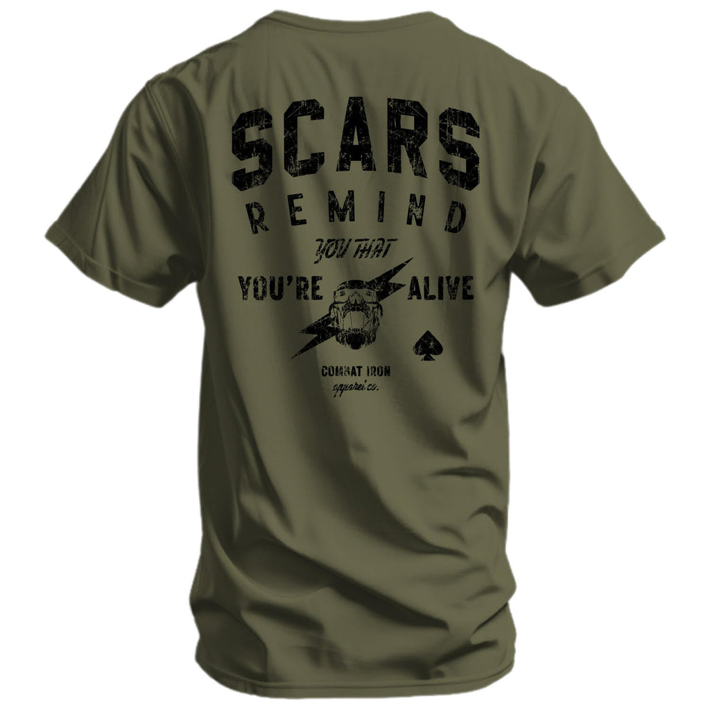 Black t-shirt with 'Scars Remind You That You're Alive' design by Combat Iron Apparel showcased on a mannequin.