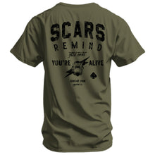Load image into Gallery viewer, Black t-shirt with 'Scars Remind You That You're Alive' design by Combat Iron Apparel showcased on a mannequin.