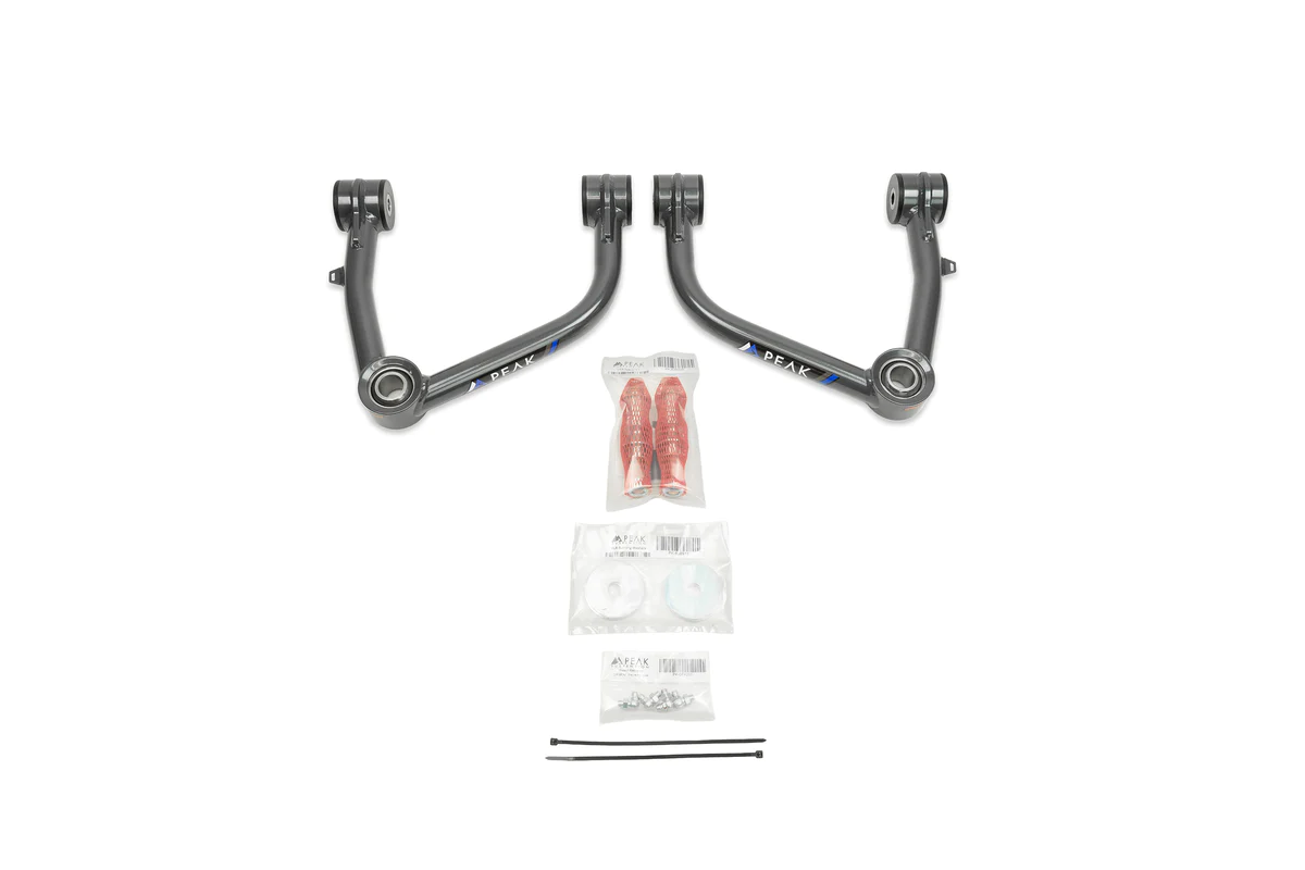 PEAK SUSPENSION Tubular Upper Control Arms for 2019+ Silverado/Sierra 1500/ZR2/AT4X, showcasing durable construction with various components including machined bushings and uniballs.