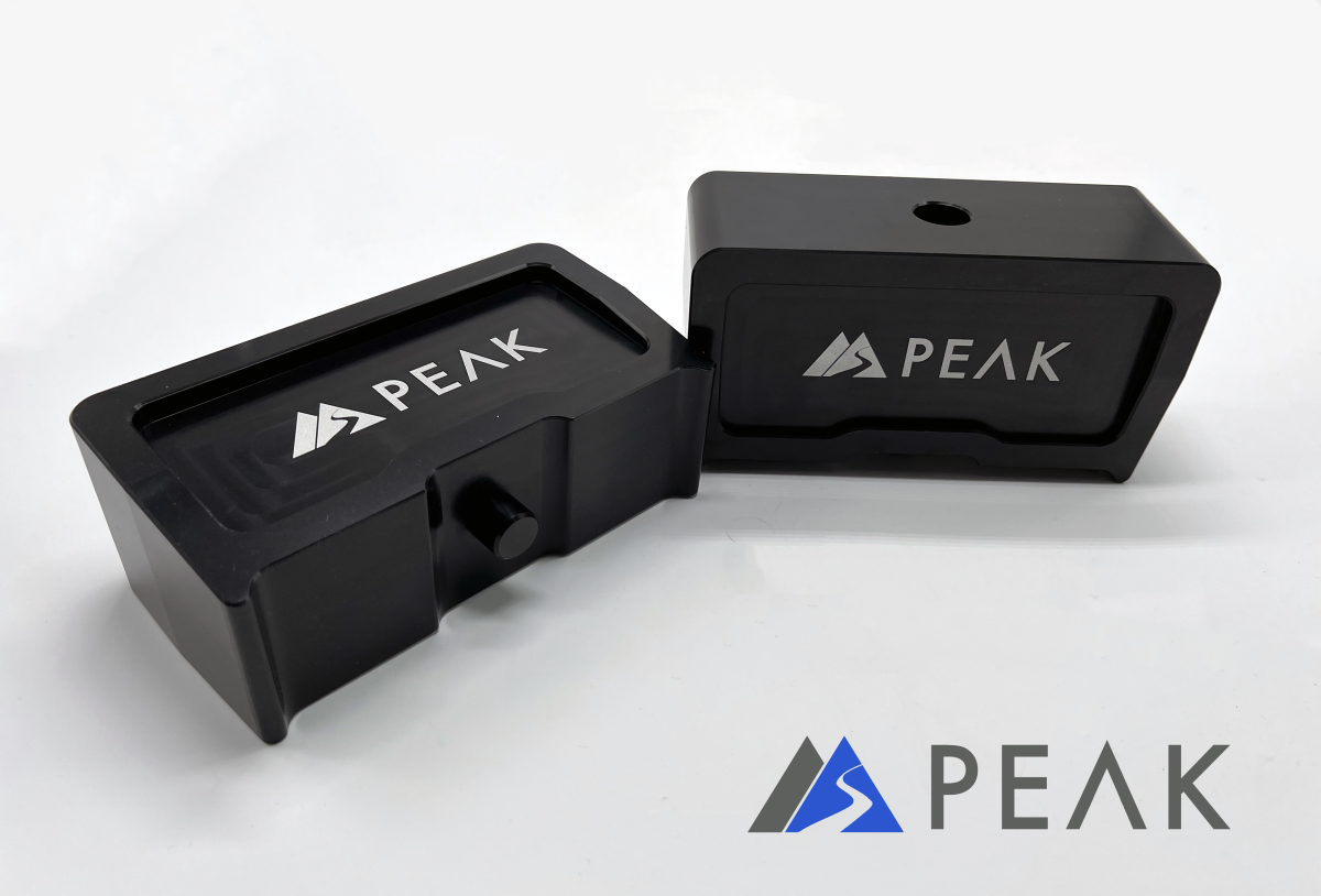 Peak Suspension Silverado ZR2 1 inch lift block featuring solid billet aluminum construction and sleek anodized finish.