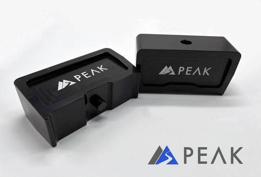 Peak Suspension Silverado ZR2 1 inch lift block featuring solid billet aluminum construction and sleek anodized finish.