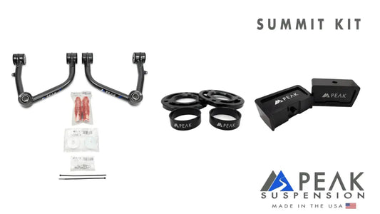 Essential components of the PEAK Suspension Silverado ZR2/Sierra AT4X Summit Kit, showcasing tubular upper control arms, lift blocks, and installation hardware.