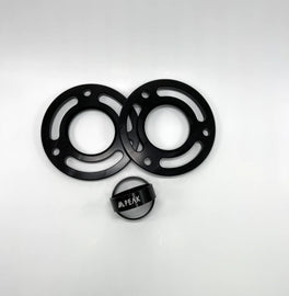 Components of the Peak Suspension 2 Piece Collar Lift Kit, including spacers and collars made for Silverado ZR2 and Sierra AT4X, showcasing high-quality craftsmanship.