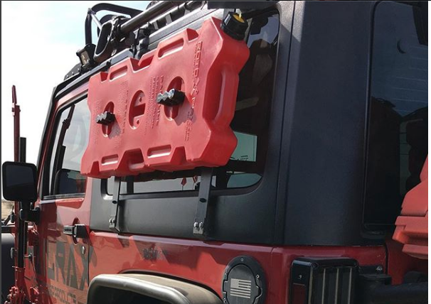 4 Gallon Gasoline container by RotopaX mounted on a rugged Jeep, demonstrating its compatibility with outdoor adventures.