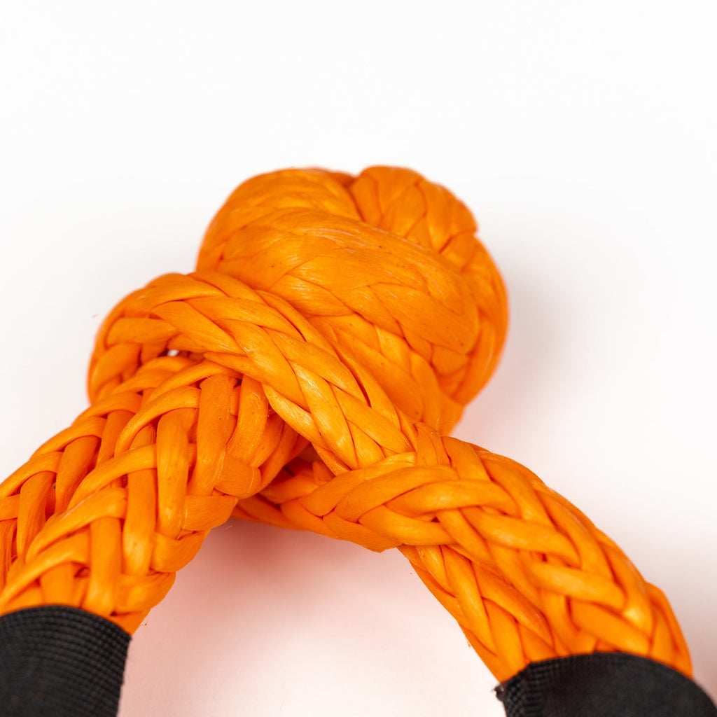 Pair of RotopaX 1/2" Soft Shackles ready for off-roading and boating recovery needs, emphasizing safety.