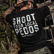Load image into Gallery viewer, Close-up of a black t-shirt showing the back print 'Shoot Your Local Pedos', designed by Combat Iron Apparel.