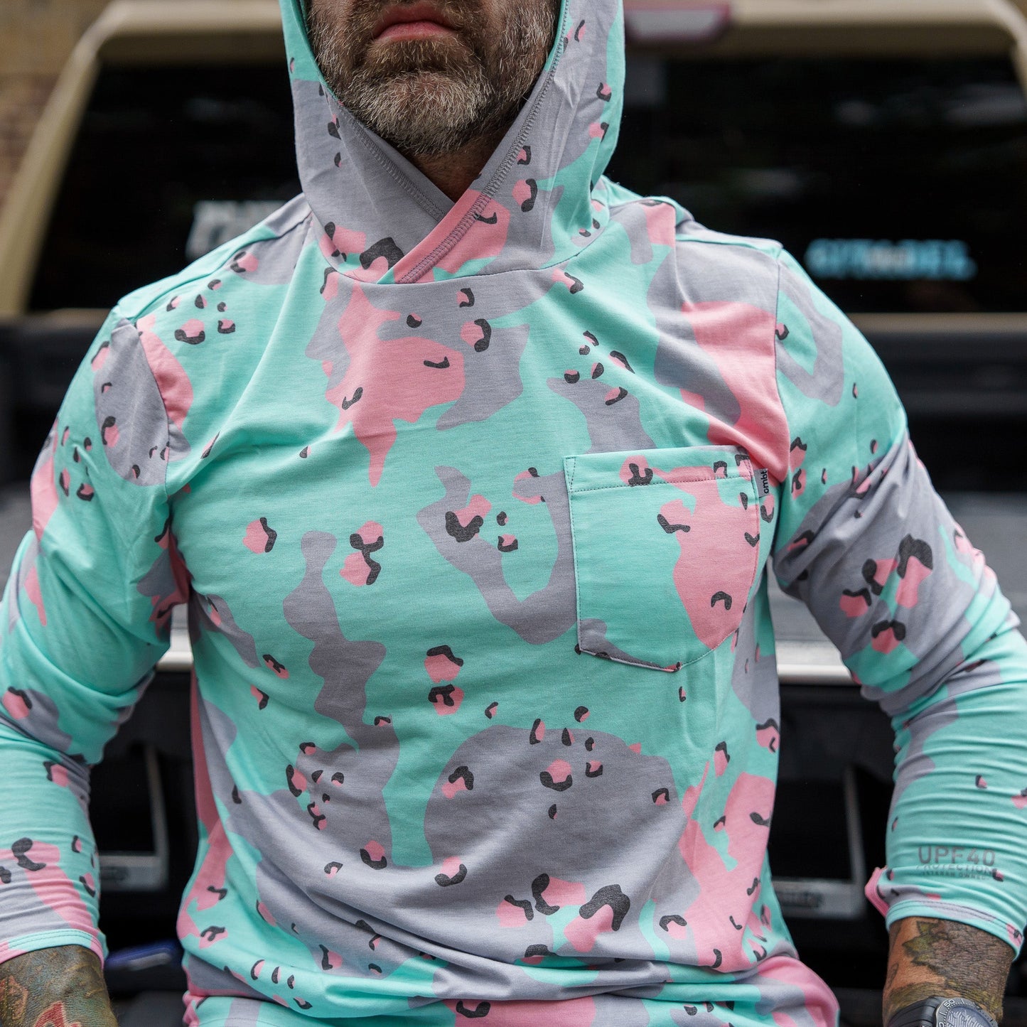 Men's Outdoors Long Sleeve Performance Hoodie in a unique camo style by Combat Iron Apparel, ready for adventure.