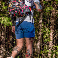 Load image into Gallery viewer, Beautifully designed Combat Iron Apparel 25L Sack™ Original All-Day Molle Backpack with Pouch on display in natural light.