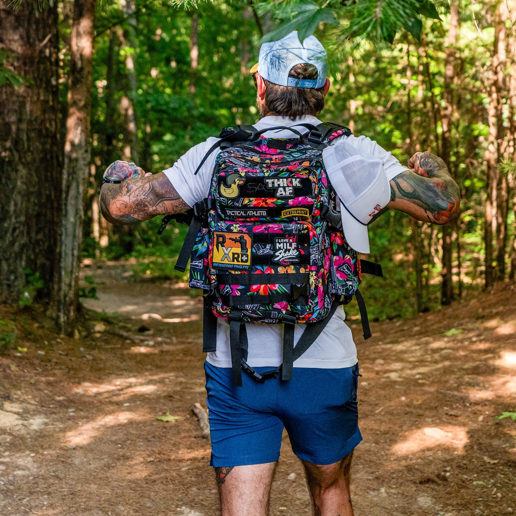 Combat Iron Apparel's 25L Sack™ Original All-Day Molle Backpack with Pouch, emphasizing its stylish and functional design.