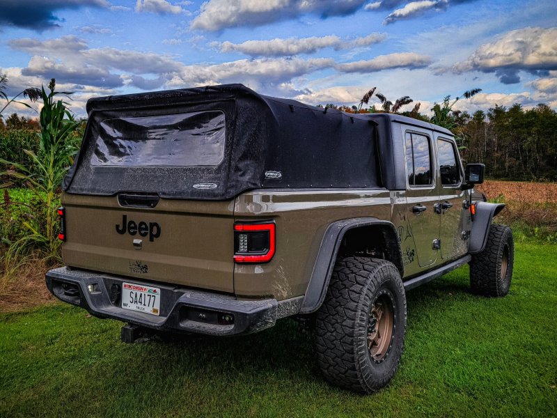 Close-up image of ORACLE Lighting Flush Mount LED Tail Lights for Jeep Gladiator JT, emphasizing sleek look.