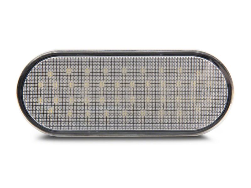 Close-up view of the Raxiom Axial Series LED Cargo Light, highlighting the bright LED pattern designed for 2015-2023 Ford F-150 and 2017-2023 Ford F-250/F-350 Super Duty.