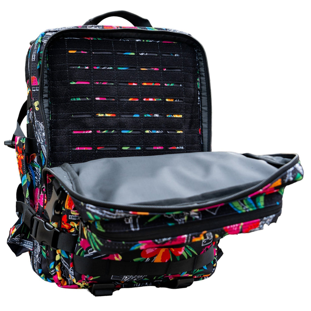 A colorful, lively view of the Combat Iron Apparel 25L Sack™ Original All-Day Molle Backpack with Pouch outdoors.