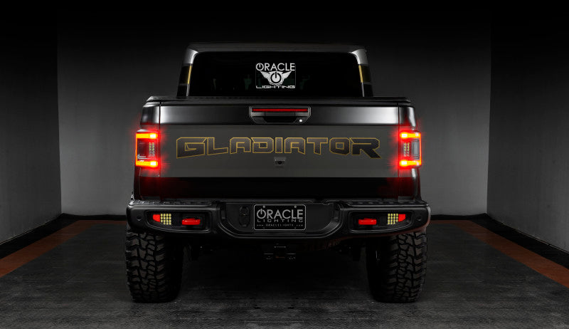 Detailed view of ORACLE Lighting Flush Mount LED Tail Lights on Jeep Gladiator JT, displaying high-quality craftsmanship.