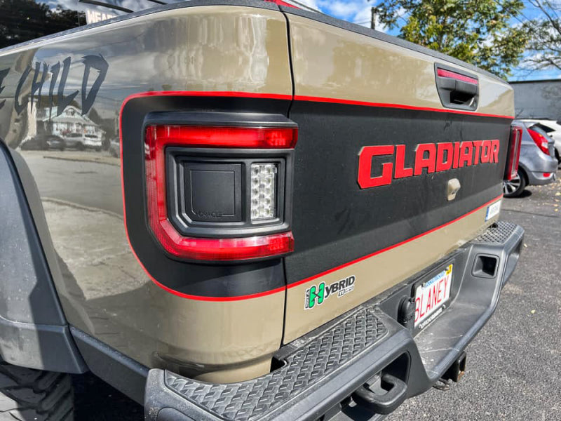 Jeep Gladiator JT equipped with ORACLE Lighting Flush Mount LED Tail Lights against a clean background.