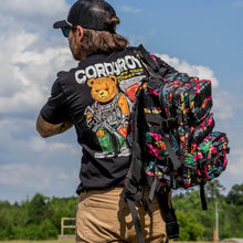 Load image into Gallery viewer, Close-up of the interior of the Combat Iron Apparel 25L Sack™ Original All-Day Molle Backpack with Pouch, showcasing its functional design.