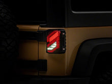 Load image into Gallery viewer, Raxiom 07-18 Jeep Wrangler JK Axial Series Trident LED Tail Lights- Blk Housing (Smoked Lens)