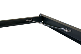 Close-up view of the 90 Degree Swing Out Bracket by Dirtbox Overland, showcasing its durable aluminum construction and gas strut mechanism for easy deployment.
