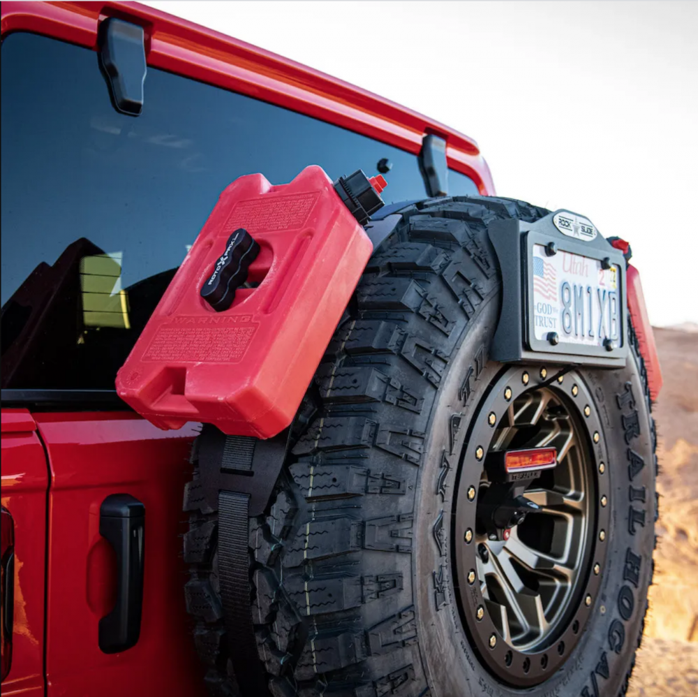 Durable and lightweight RotopaX 1 Gallon Gasoline Container displayed in bright red color for high visibility.