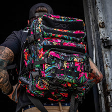 Load image into Gallery viewer, A detailed view of the vibrant floral Combat Iron Apparel 25L Sack™ Original All-Day Molle Backpack with Pouch, showing its pockets and straps.
