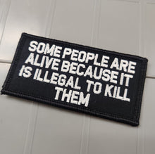Load image into Gallery viewer, As Seen on Socials - Some People Are Alive Because It Is Illegal To Kill Them - 2x4 Patch - Black w/Silver