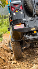 Load image into Gallery viewer, Dirtbox Overland Flatbed System Full Box in action on a rough trail, showcasing its durability and performance in off-road conditions.
