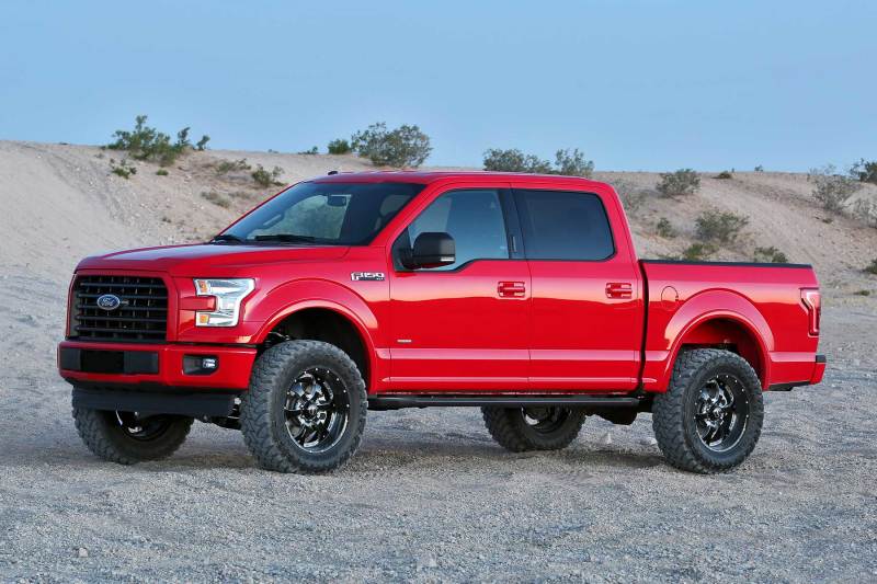 Fabtech upgraded 2015-2020 Ford F150 4WD featuring a 4in lift, rugged tires, and enhanced off-road capabilities.