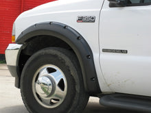 Load image into Gallery viewer, Lund 99-07 Ford F-250 RX-Rivet Style Textured Elite Series Fender Flares - Black (4 Pc.)