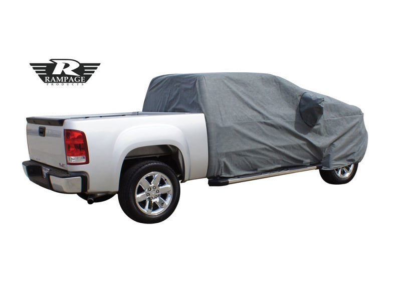 Rampage 1999-2019 Universal Easyfit Truck Cover 4 Layer in grey, protecting a white truck, showcasing its practical design and snug fit.