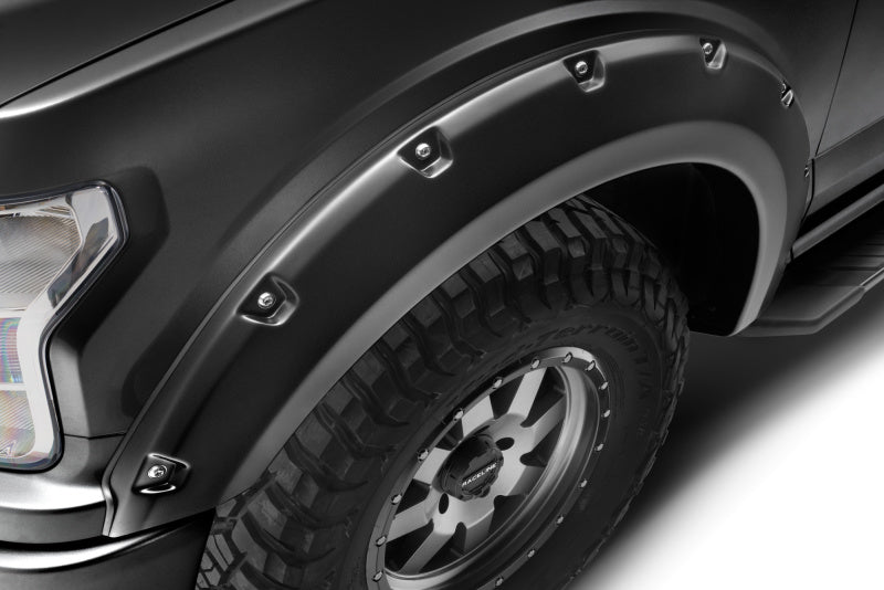 Bushwacker Pocket Style Flares for 2018-2020 Ford F-150 in Agate Black Met highlighting durability and tread, perfect for off-road adventures.