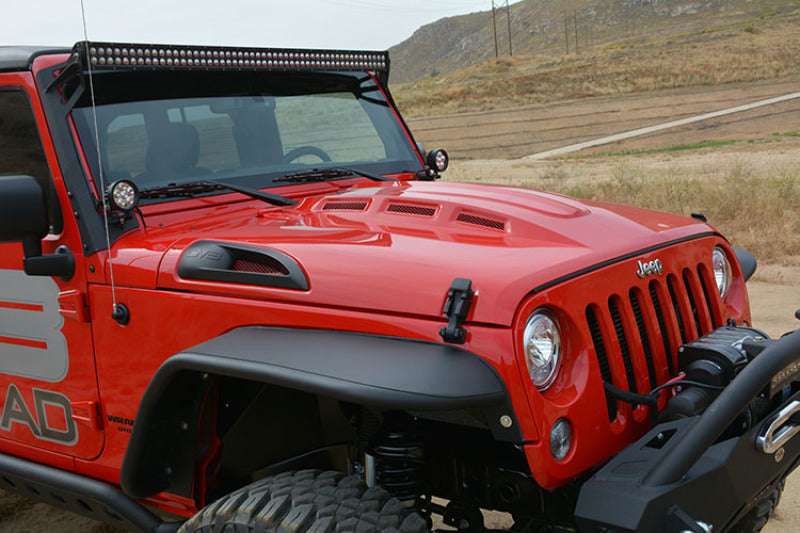 Close-up of the DV8 Offroad Metal Heat Dispersion Hood with Jeep branding.