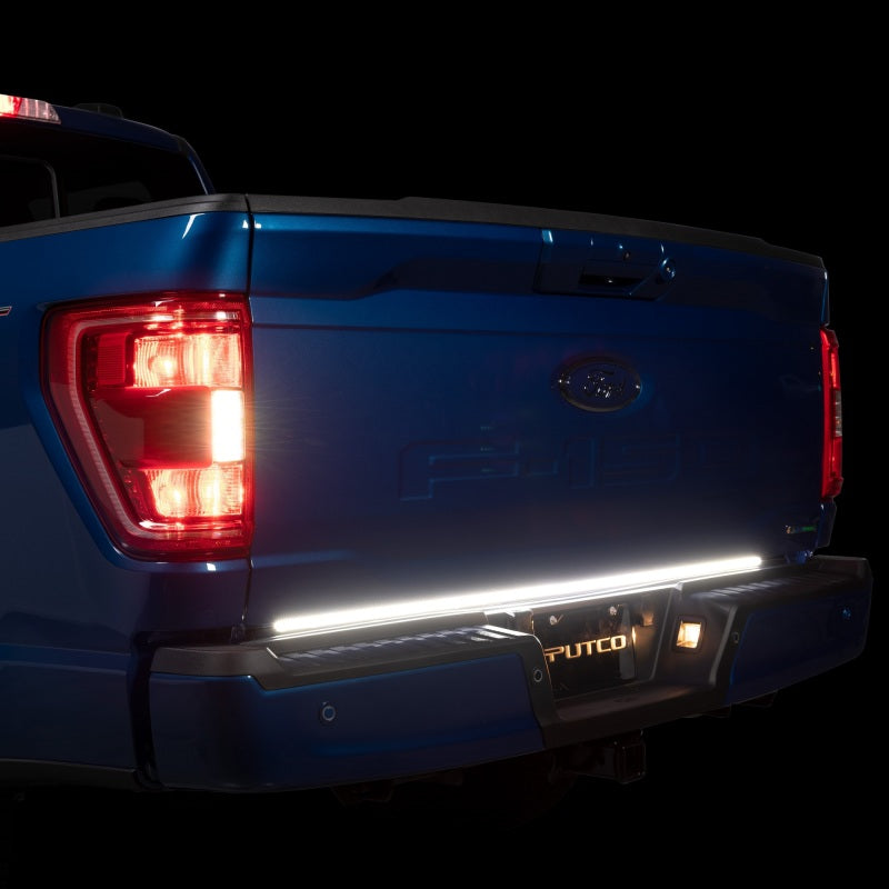 Putco 21-22 Ford F-150 60in Red Light Blade Direct Fit Kit Red/White on a blue Ford F-150 tailgate with white reverse light functionality.
