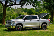 Load image into Gallery viewer, UnderCover 05-15 Toyota Tacoma 5ft SE Bed Cover - Black Textured (Req Factory Deck Rails)