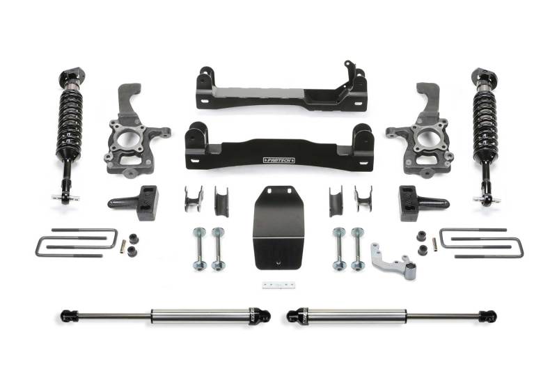 Complete Fabtech 4-inch Performance System kit for 2015-2020 Ford F150 4WD trucks featuring high-quality components including Dirt Logic shocks, designed for optimal performance and enhanced off-road capability.