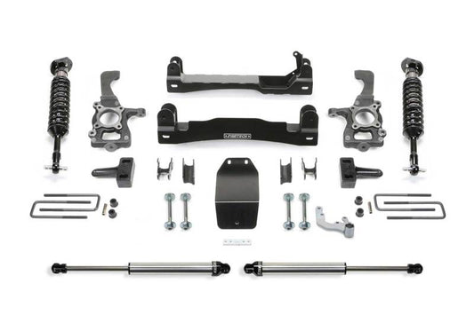 Complete Fabtech 4-inch Performance System kit for 2015-2020 Ford F150 4WD trucks featuring high-quality components including Dirt Logic shocks, designed for optimal performance and enhanced off-road capability.