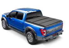 Load image into Gallery viewer, Extang 15-20 Ford F-150 (5ft. 7in. Bed) Solid Fold ALX