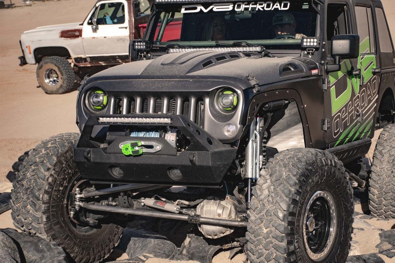Top view of DV8 Offroad Metal Heat Dispersion Hood on a red Jeep Wrangler JK.