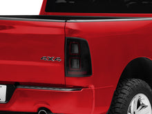 Load image into Gallery viewer, Raxiom 09-18 Dodge RAM 1500 LED Tail Lights- Black Housing (Smoked Lens)