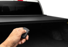 Load image into Gallery viewer, Roll-N-Lock 15-17 Ford F-150 77-3/8in E-Series Retractable Tonneau Cover