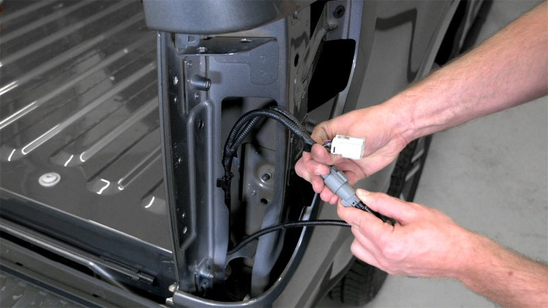 Installation process for Putco 48-inch Light Blade Direct Fit Kit for Ford Ranger, showing vehicle wiring connections.