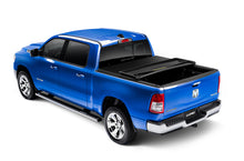 Load image into Gallery viewer, Lund 02-17 Dodge Ram 1500 (6.5ft. Bed Excl. Rambox) Genesis Elite Tri-Fold Tonneau Cover - Black