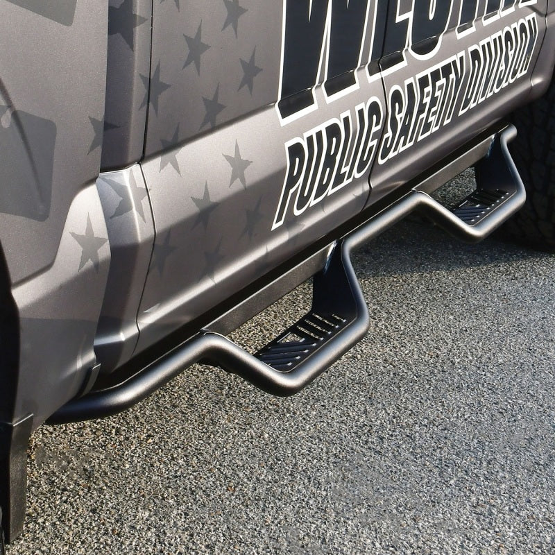 Detailed view of the Outlaw Nerf Step Bars by Westin on a Ford vehicle, perfect for easy access and style.