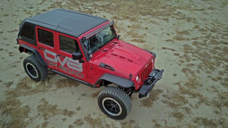 The DV8 Offroad Metal Heat Dispersion Hood shown from a side angle on a Jeep Wrangler JK.