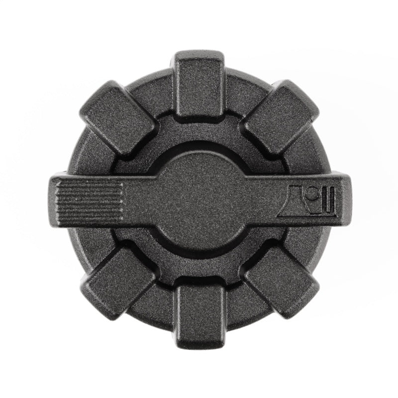 Rugged Ridge 01-19 Jeep Wrangler Black Elite Aluminum Fuel Cap showing the inside view for installation.