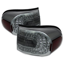 Load image into Gallery viewer, xTune Toyota Fj Cruiser 07-14 LED Tail Lights Smoke ALT-CL-TFJ07-LED-SM