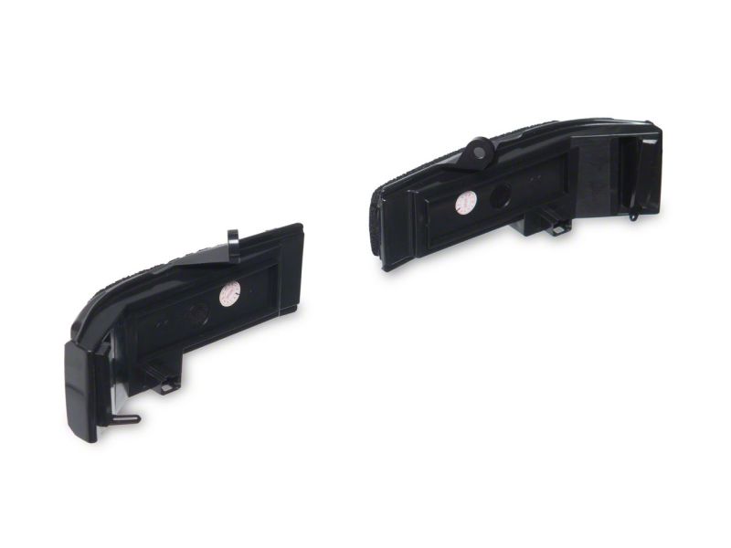 Close-up of Raxiom's LED mirror mounted turn signals, highlighting their durable design and smoked lenses.