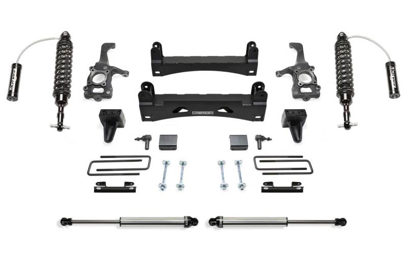 Fabtech 6-inch Performance System components for 2015-2020 Ford F-150, showcasing suspension parts including coilovers, crossmembers, and brackets.