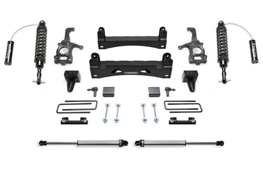 Fabtech 6-inch Performance System components for 2015-2020 Ford F-150, showcasing suspension parts including coilovers, crossmembers, and brackets.