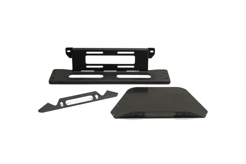 Assembly of 2021 Ford F-150 Stealth Fighter Winch Kit including essential mounting components by Addictive Desert Designs.
