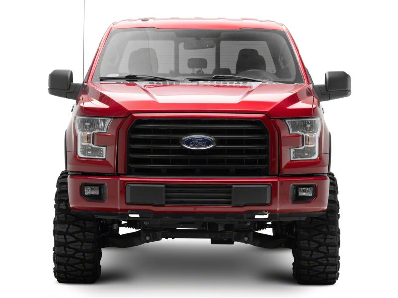 Front view of a lifted 2015-2020 Ford F-150, featuring Raxiom's Axial Series LED mirror mounted turn signals.