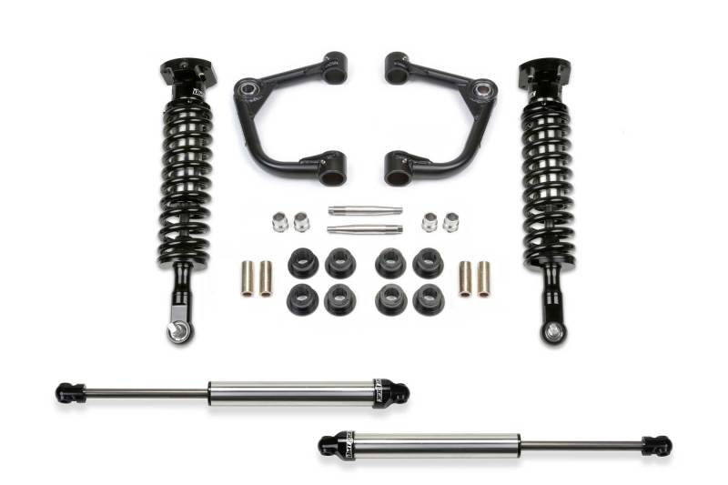 Fabtech 15-20 Ford F150 4WD 2in Uniball UCA System parts including upper control arms, coilover shocks, and hardware, designed for off-road performance.